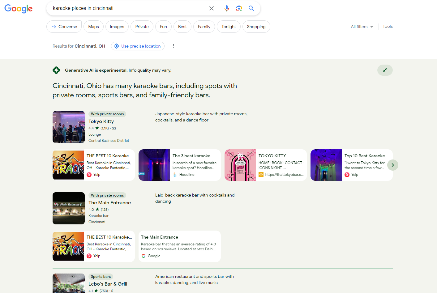 a desktop Google search for ‘karaoke places in cincinnati’ returns a generative AI response that lists one result called Tokyo Kitty categorized as ‘with private rooms’ followed by a carousel of links that likely explains more about Tokyo Kitty. The same treatment is applied to another business result with two articles referencing it